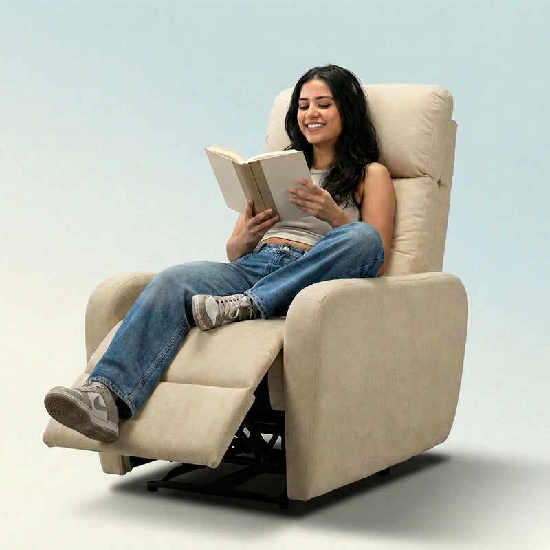 Woman reading book on Hush Hiven EVA manual recliner chair beige fabric single seater with footrest extended