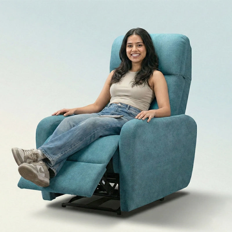 Woman relaxing on Hush Hiven EVA manual recliner chair blue fabric single seater with footrest extended for comfort