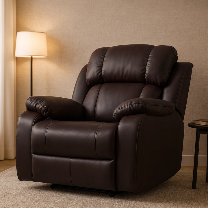 Brown leather recliner chair in a room with beige walls and a lamp.